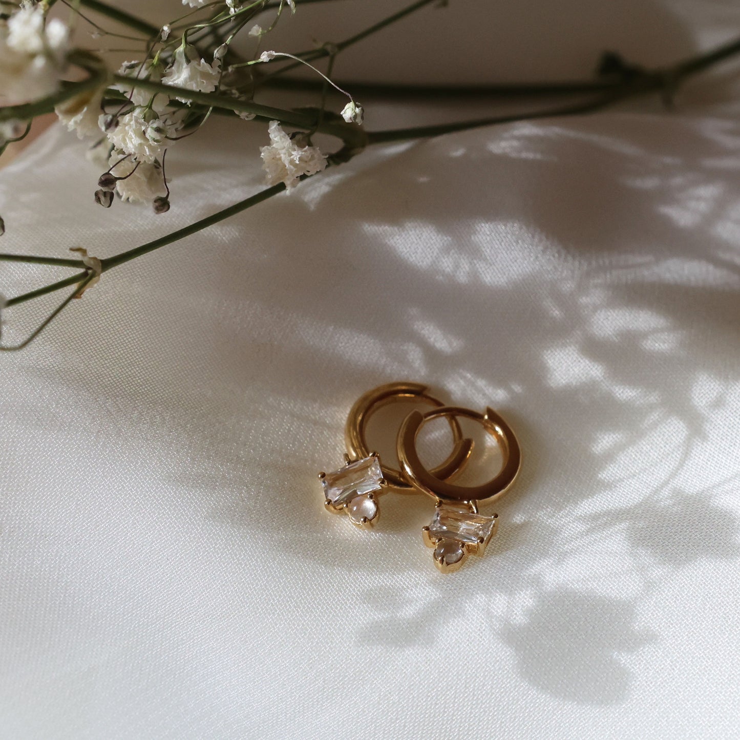 Hinge Moonstone and White Sapphire Huggies - Gold